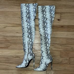 Steve Madden Dominique snake print boots. Size 7